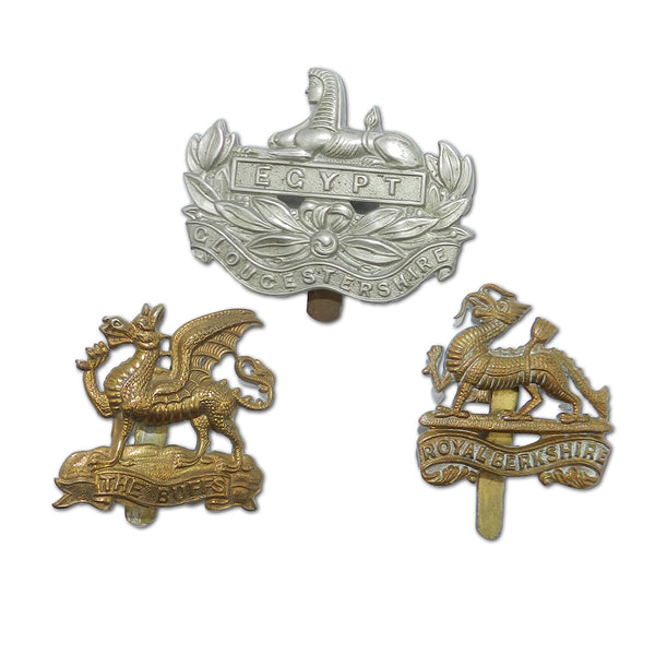 Three WWI Military Cap Badges